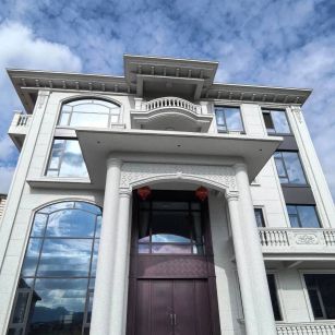 安康白麻别墅外墙干挂石材效果示例