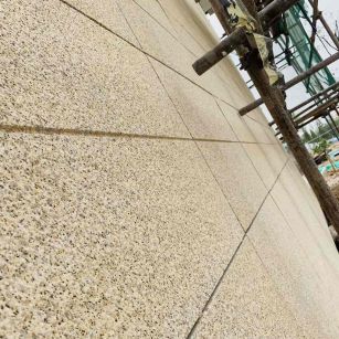 安康 黄金麻花岗岩荔枝面外墙干挂石材效果示例